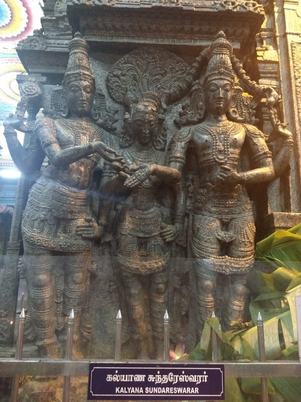 Meenakshi-Sundareshwara marriage, as Lord Vishnu gives his sister's hand in marriage.